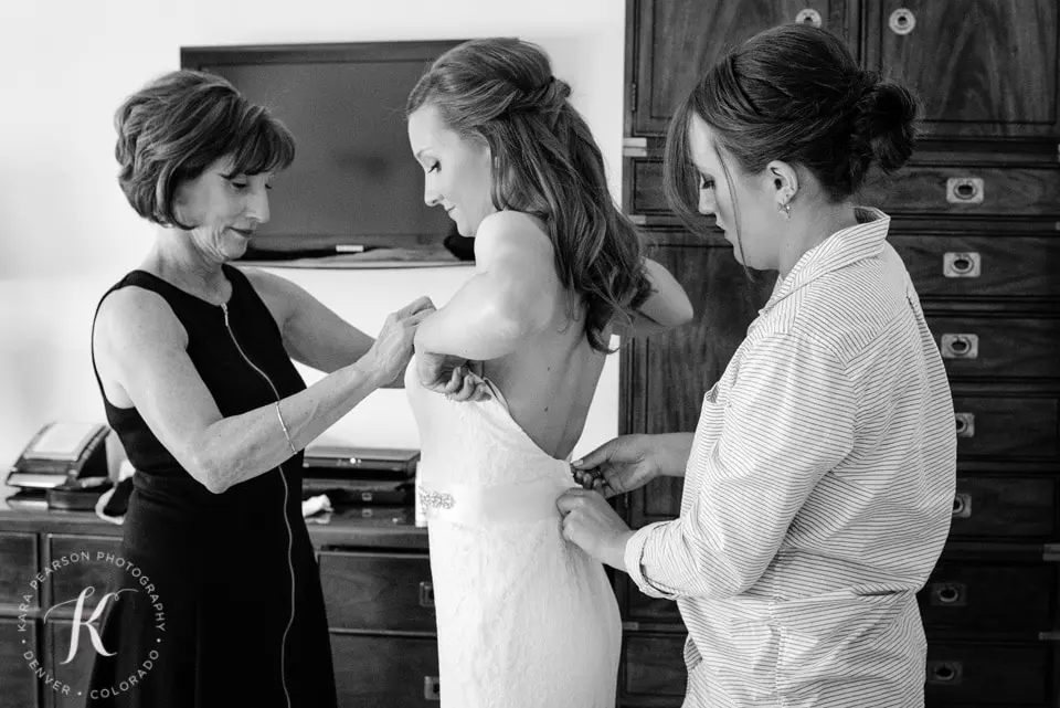 getting_wedding-dress-on