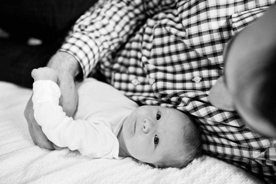 newborn baby in black and white