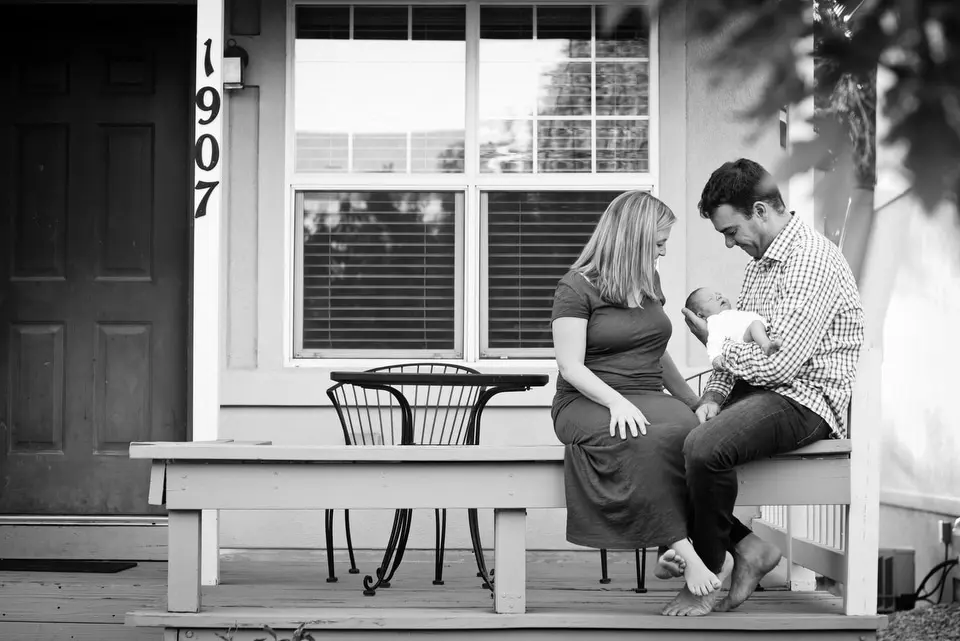 family outside their house