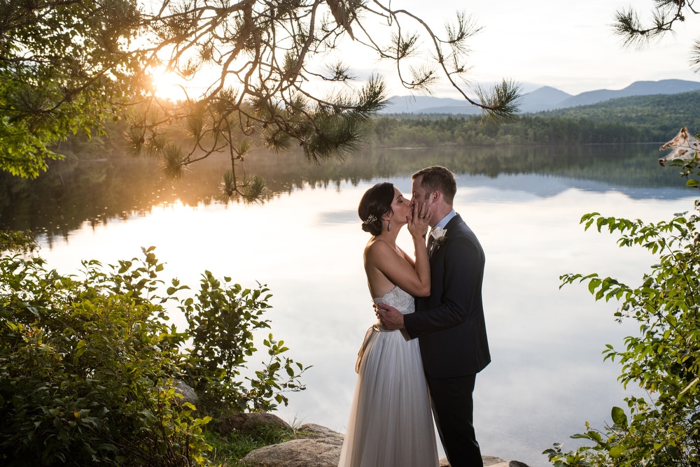 bride and groom at lake