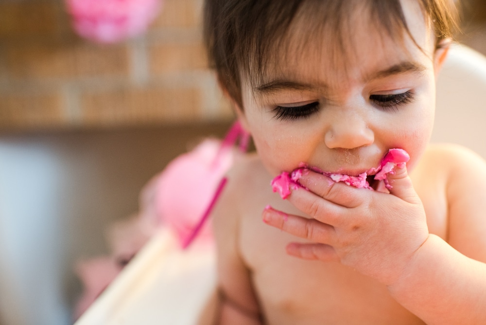 Baby eating cake