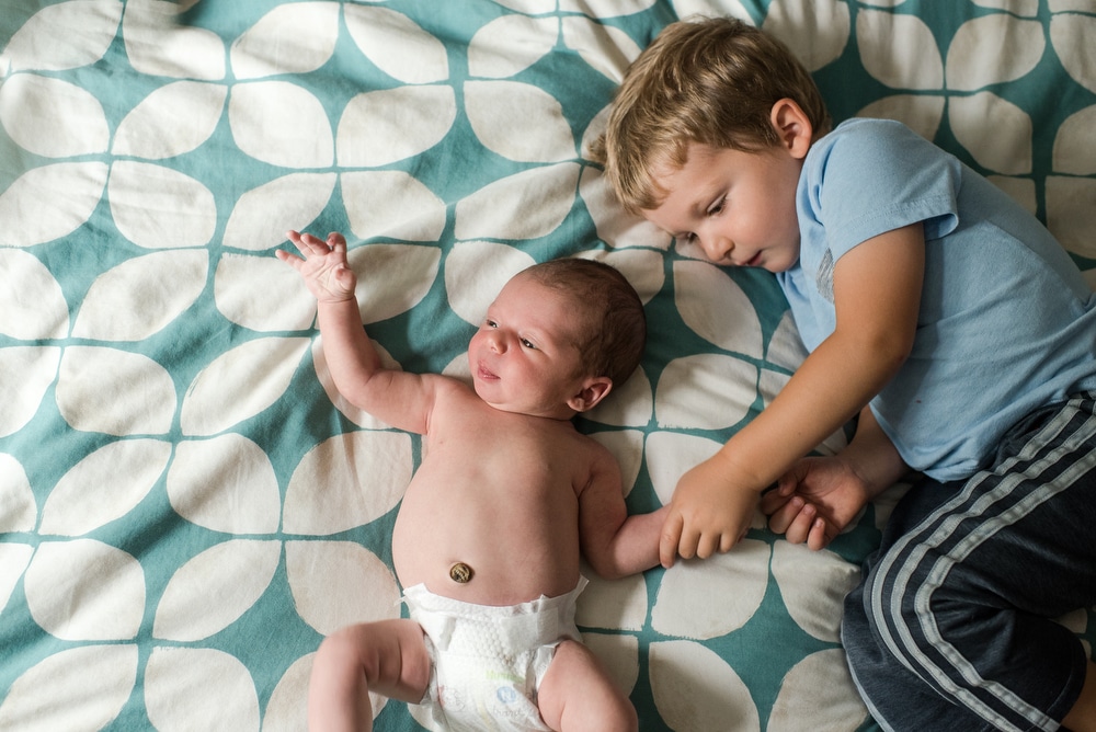 brothers holding hands