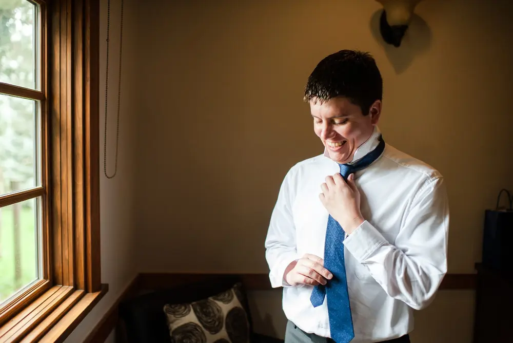 groom getting ready at hudson gardens