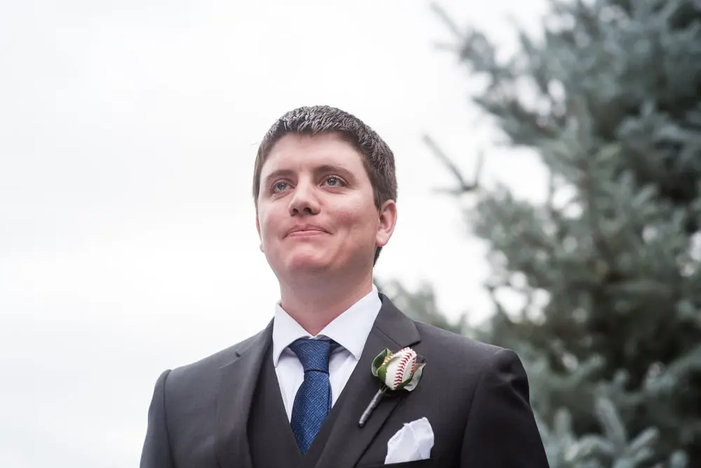 groom cries as bride walks 