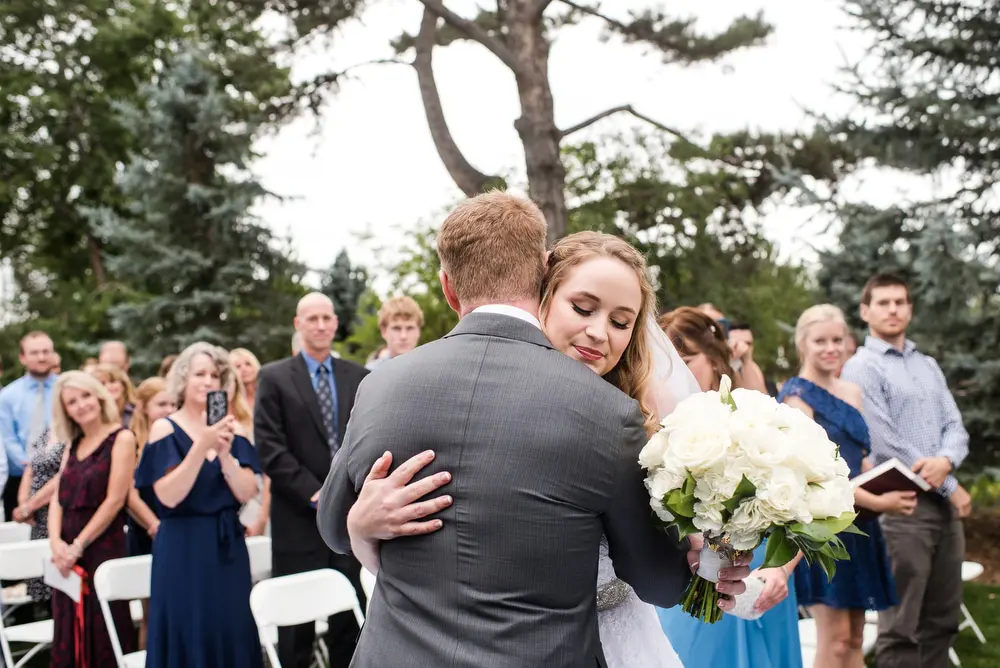 bride hugs dad 