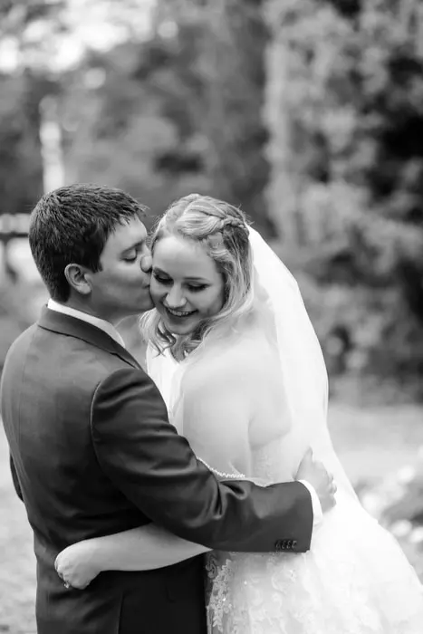 bride and groom laughing