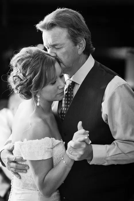 dad cries while dancing with daughter