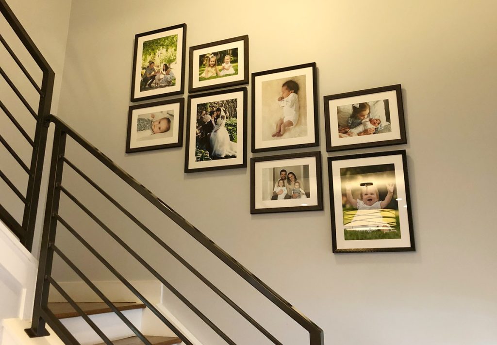 gallery wall going up a staircase