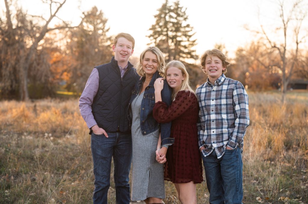 family portrait with teenagers at a park in Denver