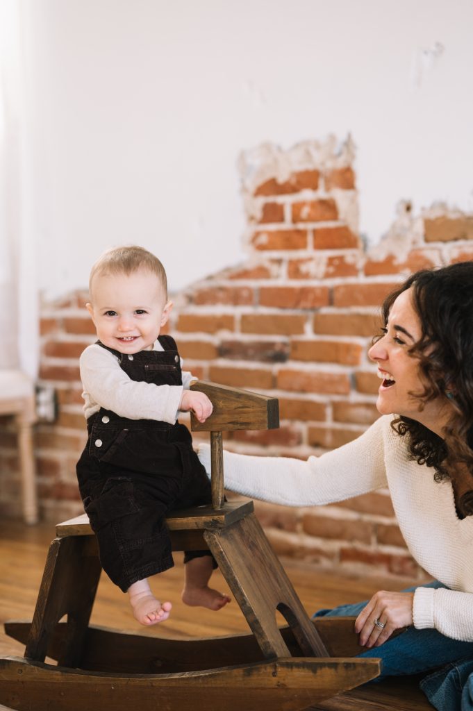 baby rocking on a horse