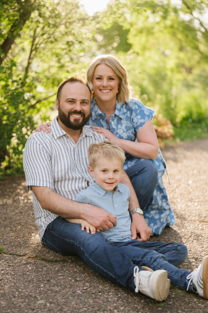 A family poses for photos in Littleton.